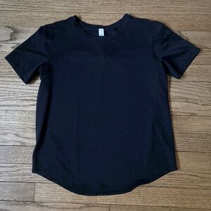 Lululemon woman’s short-sleeve shirt. Sweat, wicking, mesh fabric.